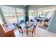 Cozy breakfast nook with views of the pool and outdoor living space at 10203 Windsong Rd, Punta Gorda, FL 33955