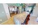Modern kitchen with granite countertops, stainless steel appliances, and breakfast bar seating at 10203 Windsong Rd, Punta Gorda, FL 33955