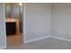 Bedroom showcases neutral walls, carpet, and a glimpse into the ensuite bathroom at 12656 Sagewood Dr, Venice, FL 34293