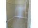 Spacious walk-in closet features carpet and wire shelving for optimal storage in a modern layout at 12656 Sagewood Dr, Venice, FL 34293