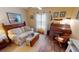 Cozy bedroom featuring natural light, a wooden writing desk, and decoratively adorned walls at 1677 Palace Ct, Punta Gorda, FL 33980