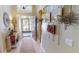 Welcoming foyer with decorative accents and views of the front door and hallway at 1677 Palace Ct, Punta Gorda, FL 33980