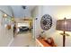 Hallway with decor leading to the living room with a view of the lanai at 1677 Palace Ct, Punta Gorda, FL 33980