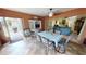 Spacious lanai featuring tile floors, a dining table, and access to the backyard at 1677 Palace Ct, Punta Gorda, FL 33980