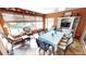 Inviting lanai with tile floors, comfortable seating, and decorative accents at 1677 Palace Ct, Punta Gorda, FL 33980