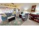 Cozy living room with comfortable seating and an inviting atmosphere, with view of lanai at 1677 Palace Ct, Punta Gorda, FL 33980