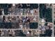 Aerial view of property lines and surrounding neighborhood, showing proximity to other homes and trees at 18459 Inwood Ave, Port Charlotte, FL 33948