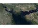Aerial view showing location relative to water, Port Charlotte Beach Park, and other local landmarks at 18459 Inwood Ave, Port Charlotte, FL 33948