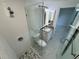Elegant bathroom showcasing a glass shower, granite vanity, and ample lighting at 18459 Inwood Ave, Port Charlotte, FL 33948