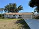 Charming single story home with well maintained lawn and neutral color scheme at 18459 Inwood Ave, Port Charlotte, FL 33948