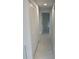 Hallway featuring marble floors and access to various rooms at 18459 Inwood Ave, Port Charlotte, FL 33948