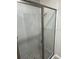 Glass enclosed shower stall with gray tiled floor and walls at 198 Arch Dr, Rotonda West, FL 33947