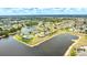 Desirable community with beautiful waterfront views and luxury homes surrounding a scenic lake at 2202 Peterborough Rd, Punta Gorda, FL 33983