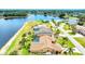 Spacious waterfront property featuring a private pool, expansive backyard, and serene water views at 2202 Peterborough Rd, Punta Gorda, FL 33983