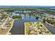 Stunning neighborhood featuring waterfront properties, lush landscaping, and desirable lakefront living at 2202 Peterborough Rd, Punta Gorda, FL 33983