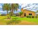 Lush backyard with a screened patio offers an ideal space for relaxation and outdoor entertainment at 2202 Peterborough Rd, Punta Gorda, FL 33983