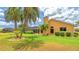 Lush backyard with a screened patio offers an ideal space for relaxation and outdoor entertainment at 2202 Peterborough Rd, Punta Gorda, FL 33983