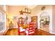 Formal dining area with stylish decor, wooden floors, a star decoration, and an arched entryway at 2202 Peterborough Rd, Punta Gorda, FL 33983