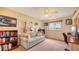 Comfortable living room with sofa, guitars hanging on wall, and window for natural light at 2202 Peterborough Rd, Punta Gorda, FL 33983