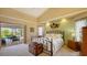 Bedroom featuring decor wall, slider to lanai and neutral colors at 2202 Peterborough Rd, Punta Gorda, FL 33983
