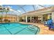 Stunning pool with covered patio area, offering perfect spot for relaxing and outdoor entertaining at 2202 Peterborough Rd, Punta Gorda, FL 33983