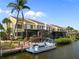 Waterfront condo with a private dock, perfect for boating enthusiasts, and an enclosed porch for relaxing outdoors at 25188 Marion Ave # 1038, Punta Gorda, FL 33950