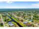 A peaceful community with tree-lined streets and canal frontage, providing a serene and desirable location at 265 White Marsh Ln, Rotonda West, FL 33947