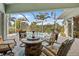 Relax on this screened patio overlooking the pool and lush landscaping at 265 White Marsh Ln, Rotonda West, FL 33947