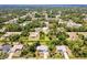 Sprawling community featuring single-Gathering homes amid lush greenery and well-maintained streets, creating a serene residential atmosphere at 2685 Nanette Ln, North Port, FL 34286