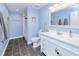 Bathroom featuring updated vanity, modern tiling, and coordinated decor at 2685 Nanette Ln, North Port, FL 34286