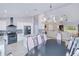 Dining area with kitchen and living room views in an open-concept floor plan at 2685 Nanette Ln, North Port, FL 34286