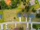 Aerial view showcasing a well-maintained home and surrounding neighborhood at 27263 Deep Creek Blvd, Punta Gorda, FL 33983