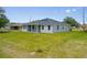 This house has a big backyard that is perfect for to run around and play at 27263 Deep Creek Blvd, Punta Gorda, FL 33983