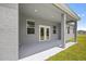 Covered patio with gray columns, providing a relaxing outdoor space at 27263 Deep Creek Blvd, Punta Gorda, FL 33983