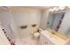 Bathroom featuring a tub/shower combo, toilet, sink, and vanity with a mirrored medicine cabinet at 311 Garvin St # 405A, Punta Gorda, FL 33950