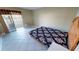 Bedroom with waterfront access featuring a large bed and sliding glass door to the outside at 311 Garvin St # 405A, Punta Gorda, FL 33950