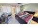 A comfortable bedroom featuring dual closets and a desk and chair at 311 Garvin St # 405A, Punta Gorda, FL 33950