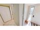 Bright entryway featuring tiled floors, closet storage, and a front door with decorative window for natural light at 311 Garvin St # 405A, Punta Gorda, FL 33950