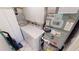The laundry room has storage cabinets, a washer and dryer, and mechanical equipment at 311 Garvin St # 405A, Punta Gorda, FL 33950