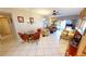 Bright living room featuring tiled floors, waterfront views, and comfortable seating at 311 Garvin St # 405A, Punta Gorda, FL 33950