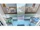 Waterfront view from screened patio, with chairs at 311 Garvin St # 405A, Punta Gorda, FL 33950