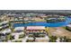 Aerial view of the community featuring waterfront access, parking, and well-maintained landscaping at 3228 Purple Martin Dr # 116, Punta Gorda, FL 33950
