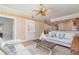 Well-lit living room adjacent to the kitchen, with neutral furniture and an inviting atmosphere at 3228 Purple Martin Dr # 116, Punta Gorda, FL 33950