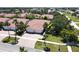 Beautiful single-story home featuring a well-kept lawn and a brick driveway leading to a two-car garage at 327 Monaco Dr # 12, Punta Gorda, FL 33950