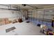 Spacious garage with ample storage space, overhead racks, and an automatic door for convenience at 327 Monaco Dr # 12, Punta Gorda, FL 33950