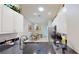 Kitchen boasting granite countertops, stainless steel appliances, white cabinets and bright lighting at 327 Monaco Dr # 12, Punta Gorda, FL 33950