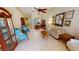 Inviting living room with tile flooring, comfortable seating, and stylish decor creating a warm and welcoming atmosphere at 327 Monaco Dr # 12, Punta Gorda, FL 33950