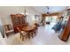 Open-concept living and dining area with elegant furnishings and ample space offers a perfect setting for gatherings at 327 Monaco Dr # 12, Punta Gorda, FL 33950