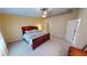 Spacious main bedroom with neutral tones and carpet flooring creates a cozy and inviting atmosphere at 327 Monaco Dr # 12, Punta Gorda, FL 33950