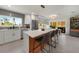 Bright, updated kitchen with center island and a dining area, perfect for Gathering gatherings and entertaining at 4229 Cockrell St, Port Charlotte, FL 33948